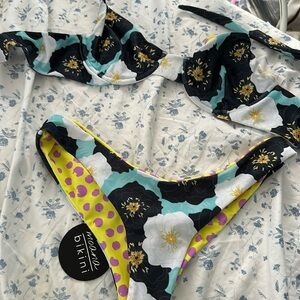 Moana bikini, reversible, bottoms size medium brand, new tag